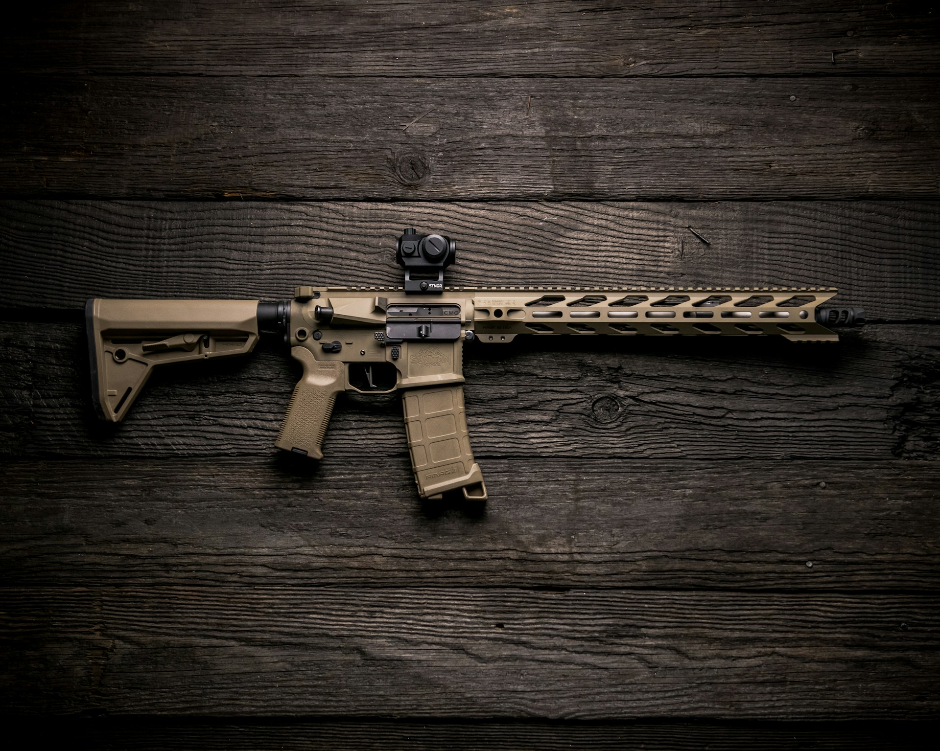 brown and black AR-15 