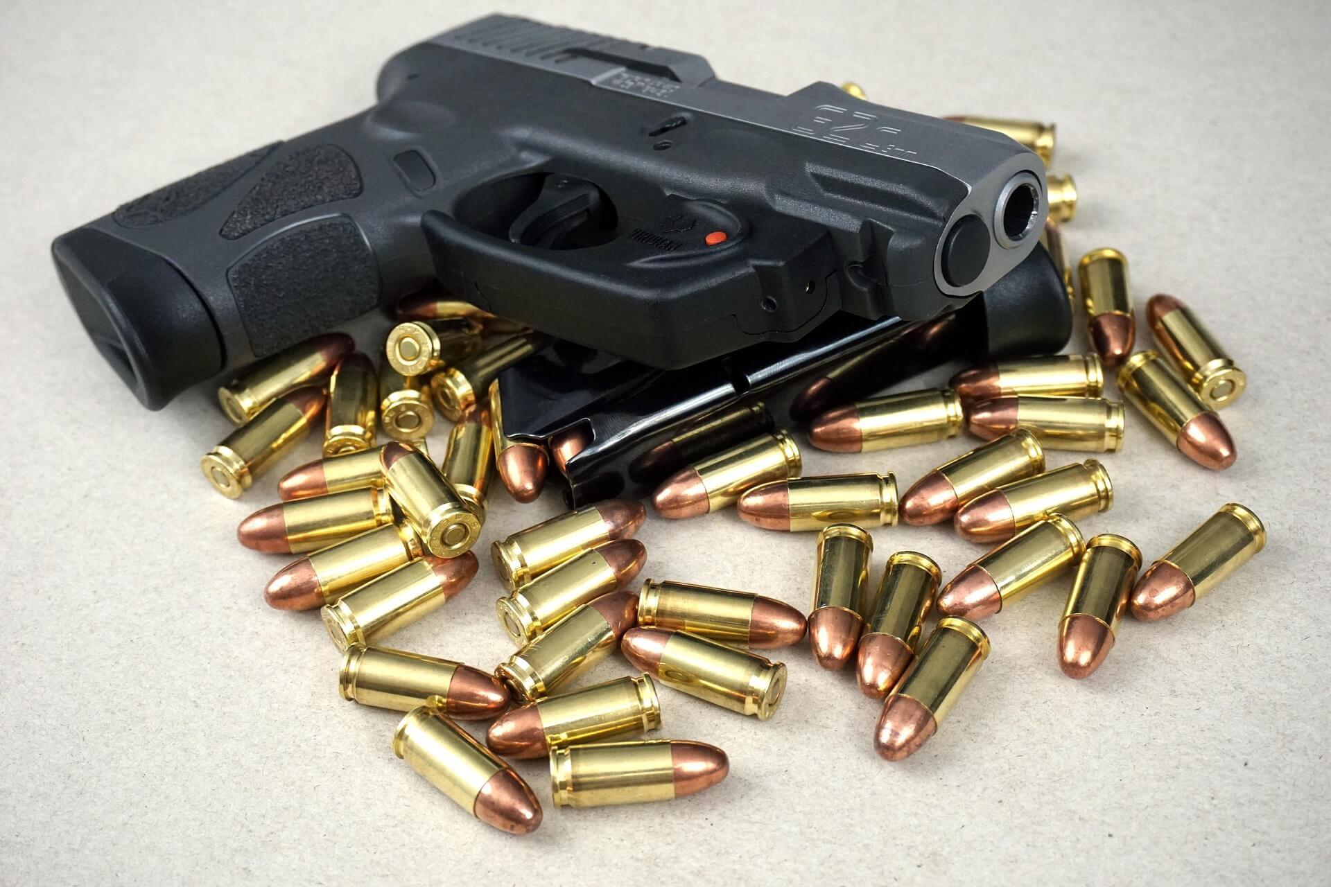 Compact handgun on pistol cartridges