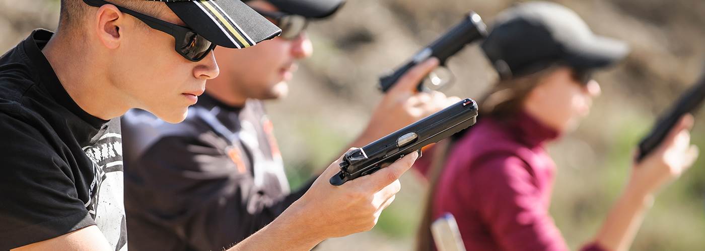 Dry firing practice with pistols at the range