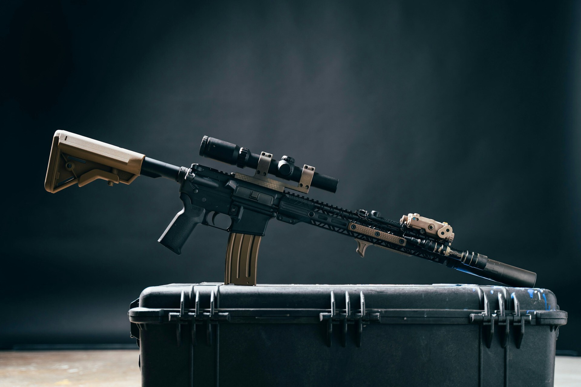 Suppressed rifle on case