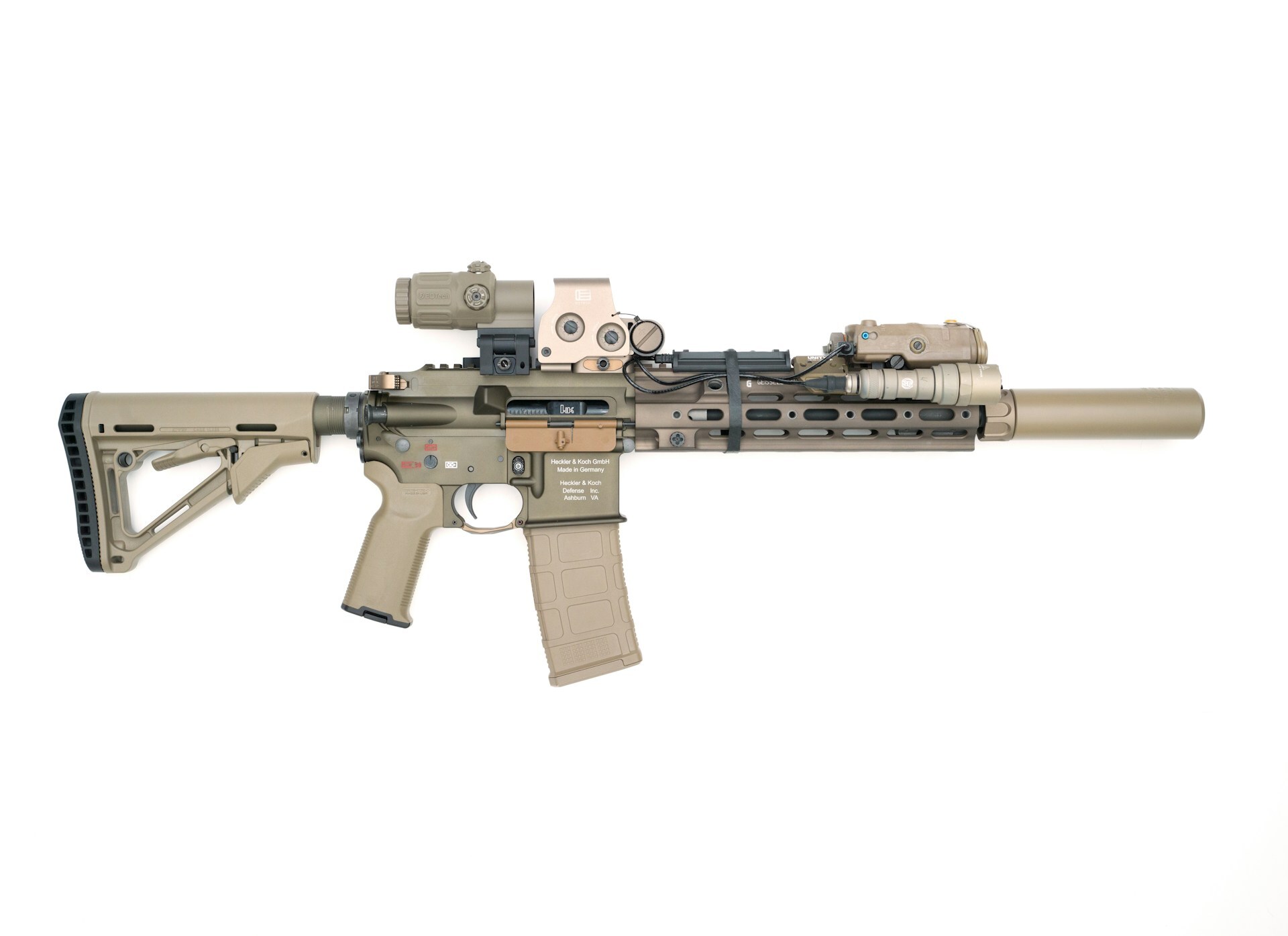 Suppressed rifle with accessories